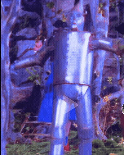 Tin Man Painting With Play Button GIF