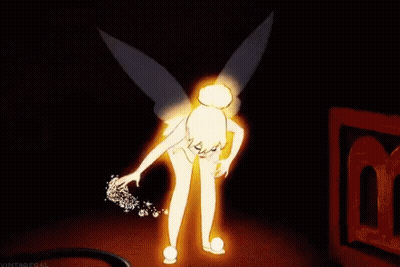 Tinkerbell Holding Fairy Wand In Dark Room GIF