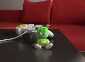 Tired Gummy Bear Lying Down GIF