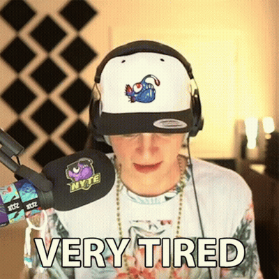 Tired Man Wearing Headphones And Hat GIF