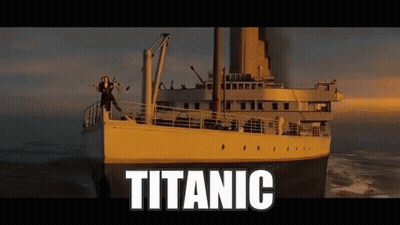 Titanic Floating In Ocean With Woman On Deck GIF