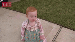 TLC Adorable Kid Winky Face  GIF
