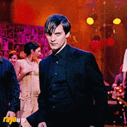 Tobey Maguire Taking Off Suit GIF