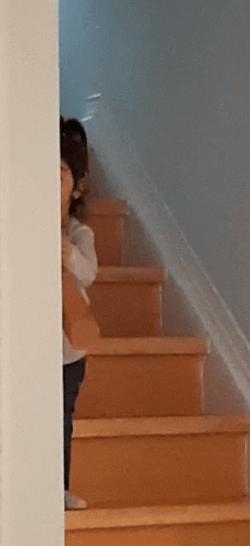 Toddler Girl Trying To Hide GIF