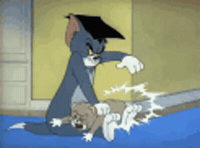 Tom And Jerry Are Fighting Each Other In A Cartoon . GIF