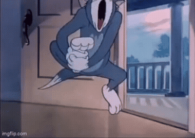 Tom And Jerry Are Jumping In The Air In A Cartoon . GIF
