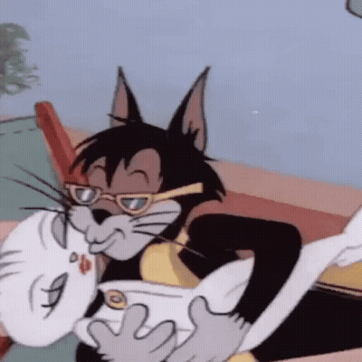 Tom And Jerry Are Kissing Each Other In A Cartoon . GIF