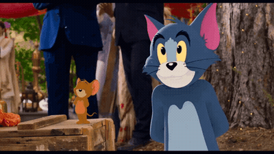 Tom And Jerry Are Standing Next To Each Other GIF