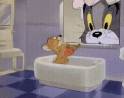 Tom And Jerry Looking At Reflection GIF