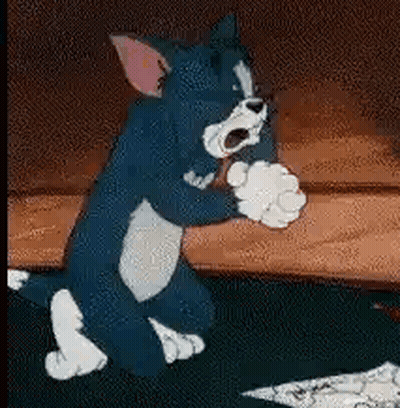 Tom And Jerry Playing With Paper GIF