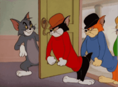 Tom And Jerry Standing In Front Of Door GIF