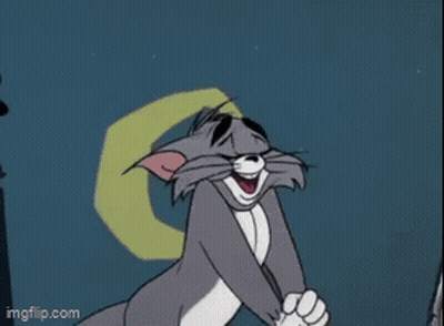 tom from tom and jerry is laughing in front of a squirrel