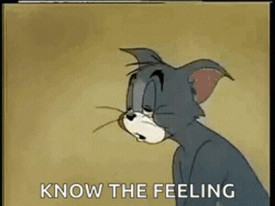 Tom From Tom And Jerry Sitting Down Looking Down GIF