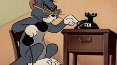 Tom Talking On FBI Phone GIF