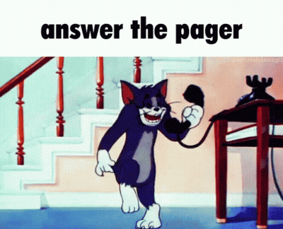 Tom Talking On Phone Saying Answer The Pager GIF