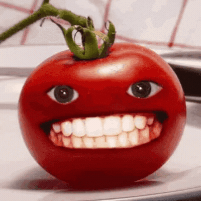 Tomato With Big Smile On Plate GIF