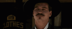 Tombstone Michael Biehn Waving GIF