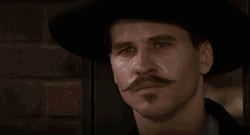 Tombstone Serious Face Of Johnny Ringo GIF