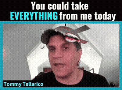 Tommy Tallarico Is Wearing A Shark Hat And Talking To The Camera GIF