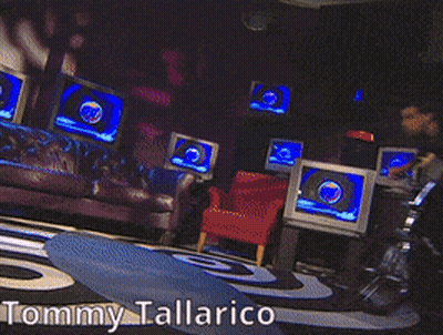 Tommy Tallarico Laying On Floor With Legs Crossed GIF