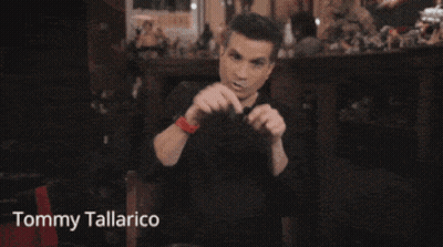 Tommy Tallarico Sitting In Front Of Fireplace GIF