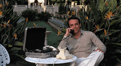 Tony Montana Laughing On Phone GIF