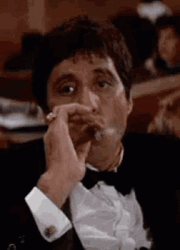 Tony Montana Smoking GIF