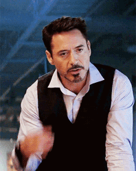 Tony Stark Sarcastic Roll Over Hand Gesture  GIF