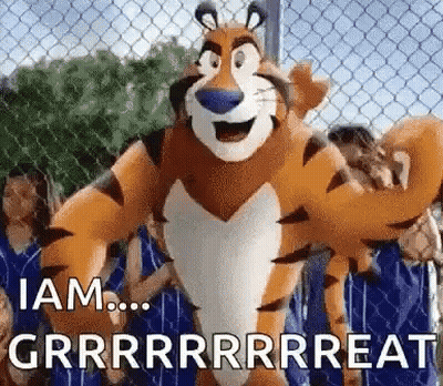 Tony The Tiger Standing In Front Of Chain Link Fence GIF