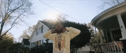 Toosii Holding Necklaces GIF