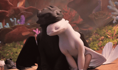 Toothless And Light Fury Are Hugging Each Other In A Scene From How To Train Your Dragon GIF
