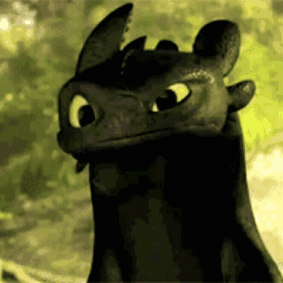 Toothless From How To Train Your Dragon Is Looking At The Camera With A Green Background . GIF