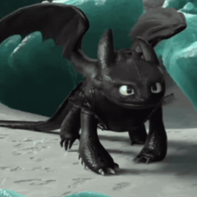 Toothless From How To Train Your Dragon Is Standing On A Rock Looking At The Camera . GIF
