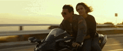 Top Gun Maverick And Girlfriend Riding Motorcycle GIF