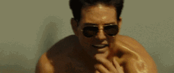 Top Gun Maverick Football Playing In The Beach GIF