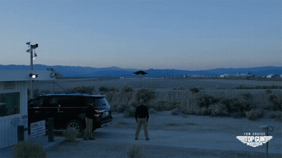 Top Gun Movie Poster Jet Over Desert GIF