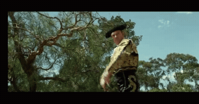 Torero Man Standing By Trees GIF