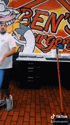 Torn Between To Sweep The Floor Or Not GIF
