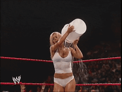 Torrie Wilson Pouring Bucket Of Water On Herself GIF