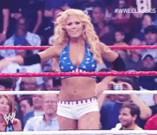 Torrie Wilson Saluting The Crowd In WWE GIF