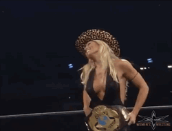 Torrie Wilson Showing Off Her Championship Belt GIF