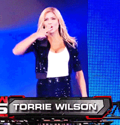 Torrie Wilson Waving Upon Introduction GIF