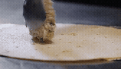 Tortilla Being Rolled With Spoon GIF