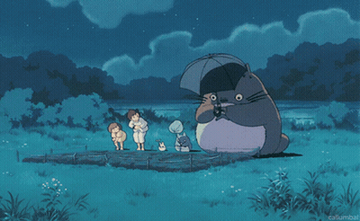 Totoro Holding Umbrella Surrounded By People GIF