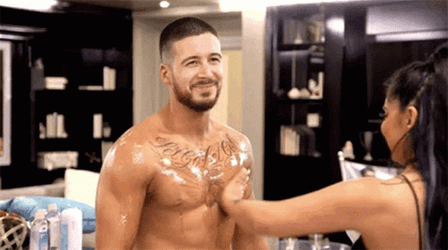 Touch Chest With Olive Oil GIF