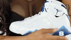 Touching Jordan 4 Shoes GIF