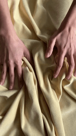 Touching The Soft Blanket GIF