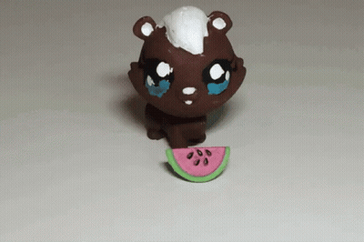 Toy Bear With Watermelon Slice In Mouth GIF