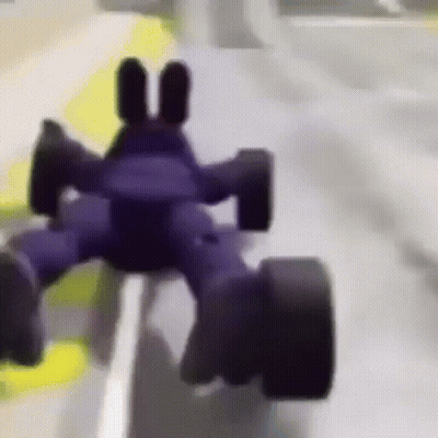 Toy Car Driving Down Road On Track GIF