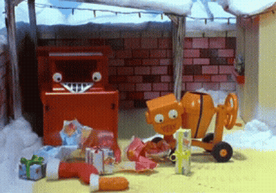 Toy Cement Mixer And Mailbox Surrounded By Presents GIF